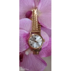 Montre Lip dame sur bracelet métal doré