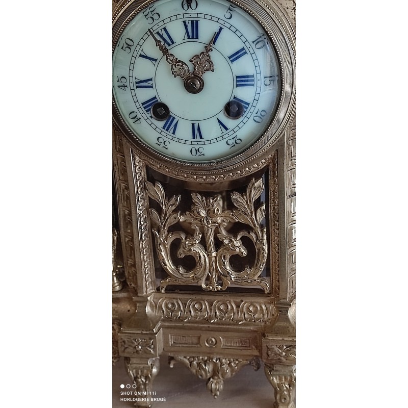 pendule mecanique ancienne bronze doré